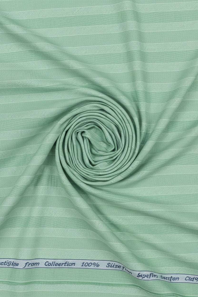Green fabric with a subtle pattern and label at the top