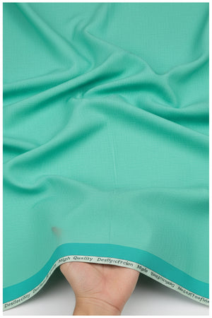 Neon green Arvind Tresca cotton unstitched shirting fabric shown in the image, featuring soft, lightweight cotton material.