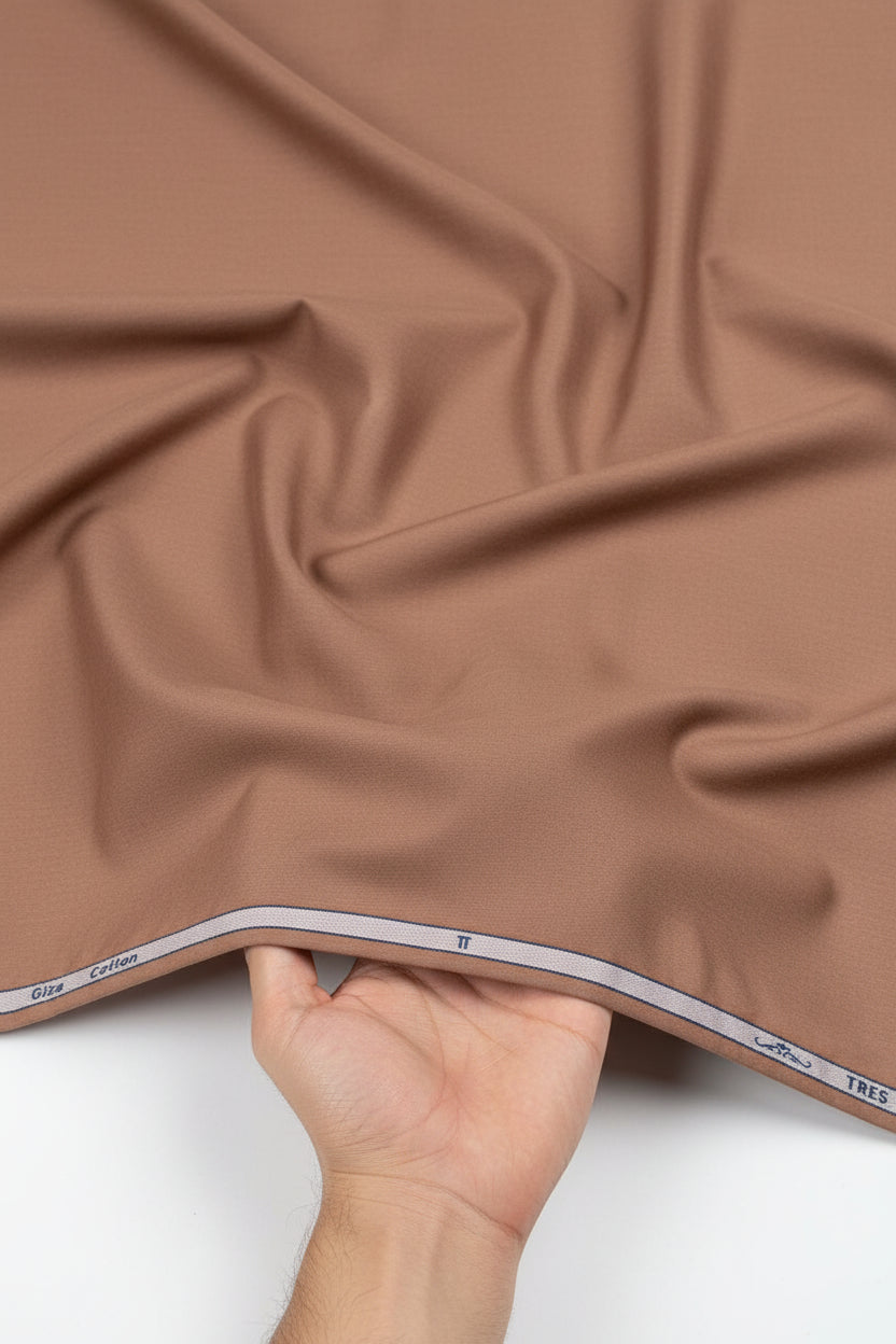 Arvind Zinia Giza cotton satin shirting fabric in saddle brown, unstitched material with smooth texture and subtle sheen.