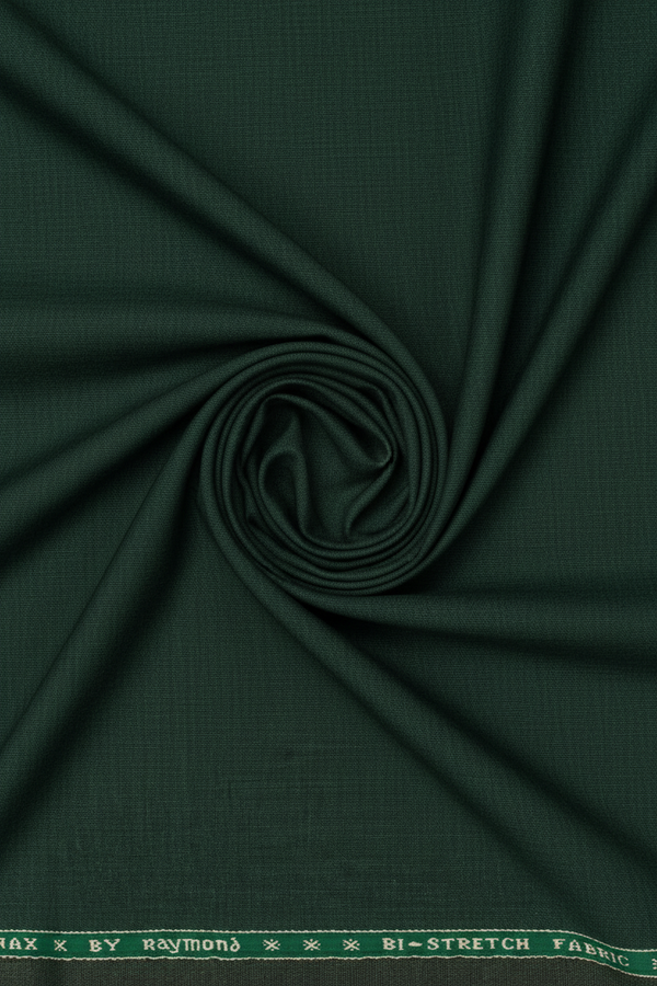 Raymond Polywool trousers and suiting fabric in seaweed green with Lycra stretch, showcasing the textured fabric and color details.