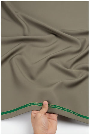 Olive khaki Raymond unstitched super 120’s polywool trousers and suiting fabric, detailed close-up of textured fabric material.