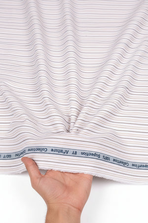 Primante Cotton Shirting Fabric by Arvind with brown pinstripes on white, showcasing the luxurious unstitched fabric for dress shirts.