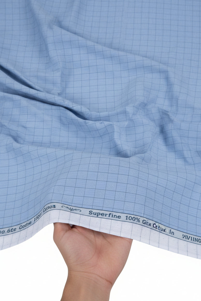 Arvind denim blue shirting fabric with a smooth texture, ideal for stylish shirts and casual wear.