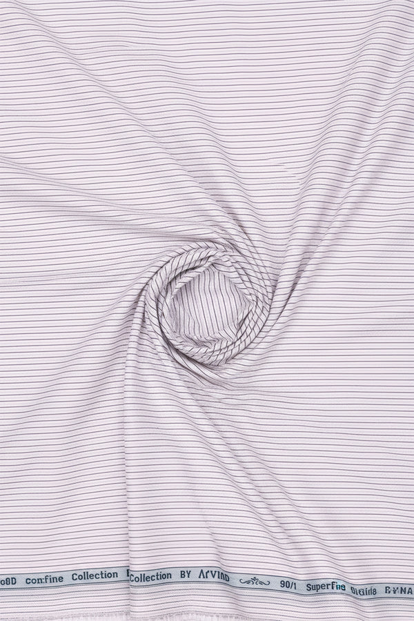 Light pink striped cotton shirt fabric from Arvind Primante, showing the soft, woven textile with evenly spaced stripes.