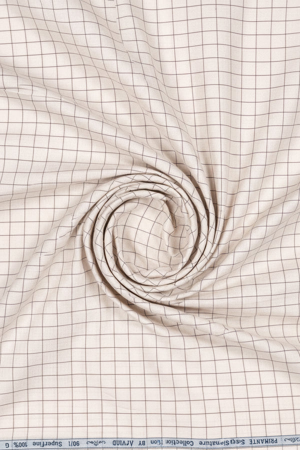 Beige Arvind Tresca shirt fabric with check pattern made from Giza cotton, shown in close-up detail.