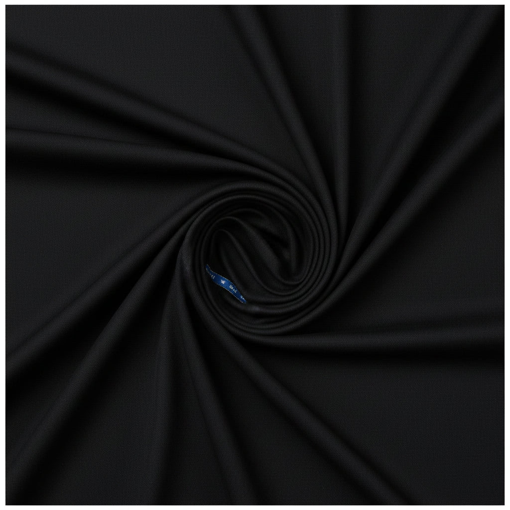 Black Raymond poly wool suiting fabric with Lycra stretch, showing a close-up of the textured fabric surface.