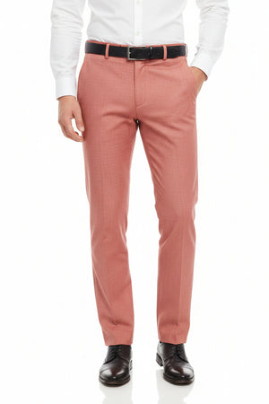 Carrot red Arvind poly viscose trousers and suiting fabric, close-up of textured fabric with subtle weave detail.