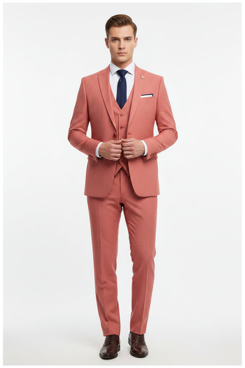 Carrot red Arvind poly viscose trousers and suiting fabric, showing a folded fabric sample with smooth texture and vibrant color.