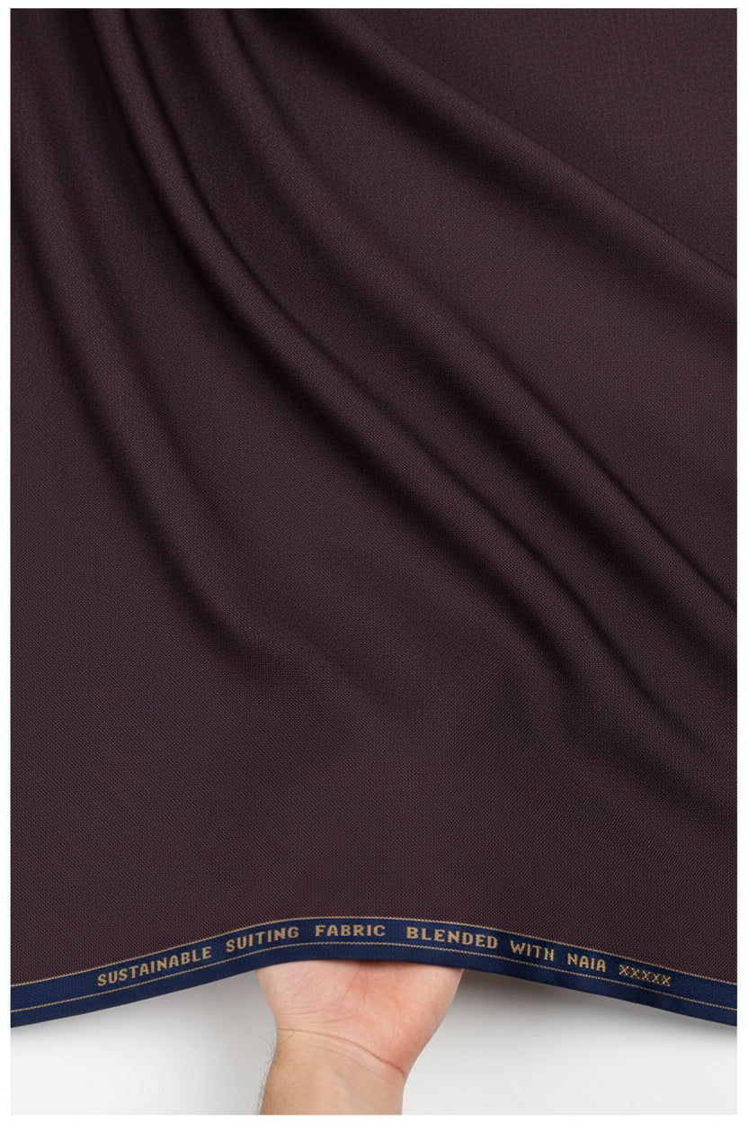 Raymond Luxurious unstitched polywool trousers and suiting fabric in grape purple, ideal for custom tailoring and formal wear.