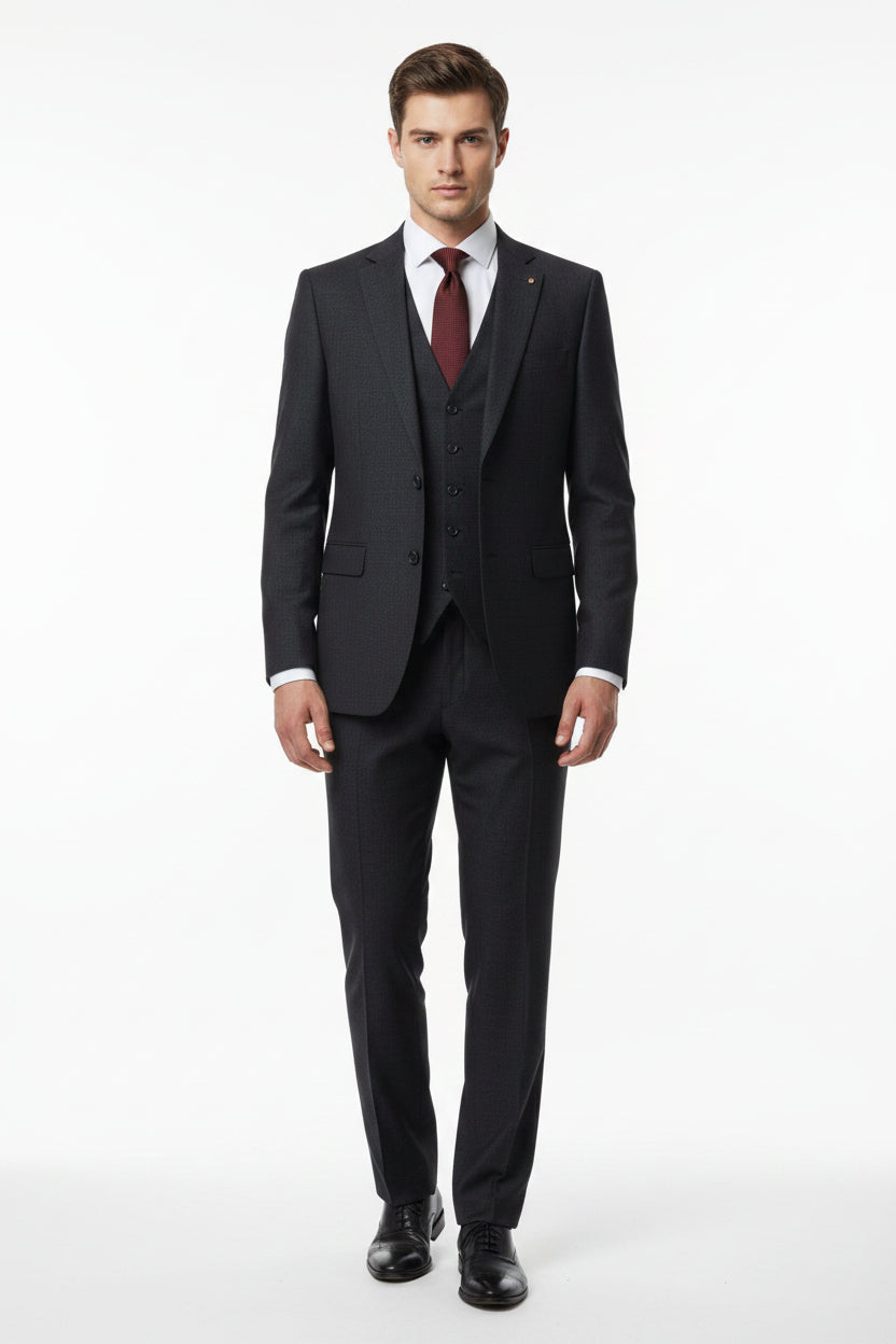 Charcoal grey Mafatlal poly viscose trouser and suiting fabric fabric, shown in a close-up image highlighting the texture and color.