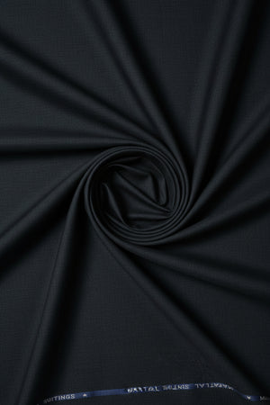 Charcoal grey Mafatlal unstitched poly viscose trouser and suiting fabric laid flat, showing the soft, smooth textile texture.