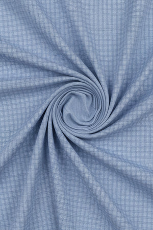 Steel blue Mafatlal cotton checks unstitched shirting fabric spread out showing checkered pattern and soft cotton texture.