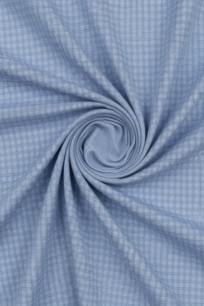 Steel blue Mafatlal cotton checks unstitched shirting fabric spread out showing checkered pattern and soft cotton texture.