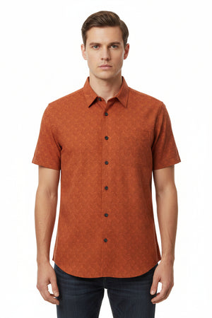 Orange printed unstitched shirting fabric from Arvind Tresca, showcasing vibrant fabric with intricate printed design.