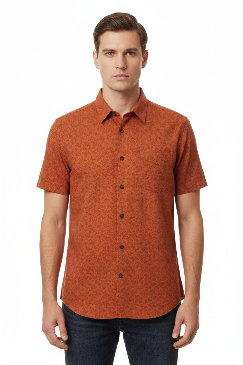Orange printed unstitched shirting fabric from Arvind Tresca, showcasing vibrant fabric with intricate printed design.