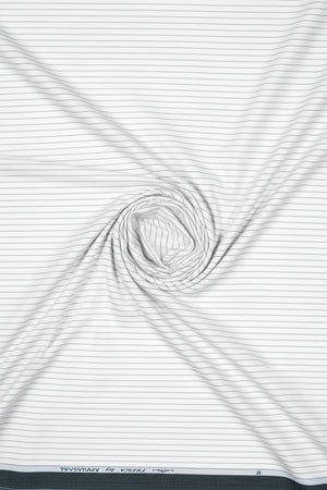 Black and white striped Arvind Tresca cotton shirt fabric showing a close-up of the premium cotton material and pattern.