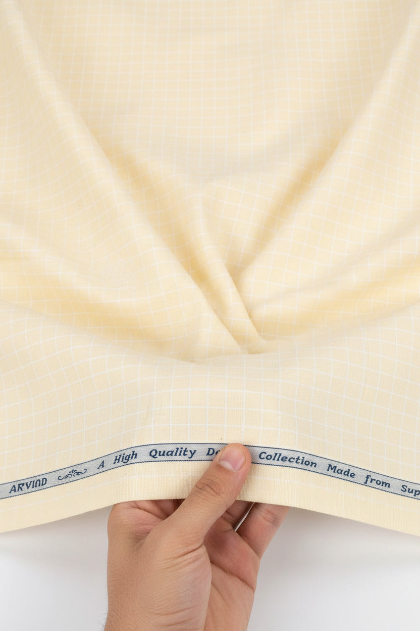 Beige fabric swatch with a visible label at the top.
