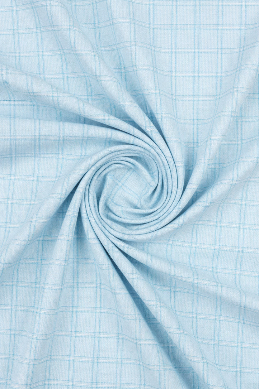 Sky blue Arvind Tresca shirt fabric in Giza cotton with check pattern, ideal for making stylish shirts.