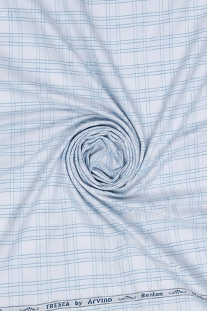 Sky blue Arvind Tresca shirt fabric with Giza cotton checks, showcasing soft, high-quality woven textile for shirts.