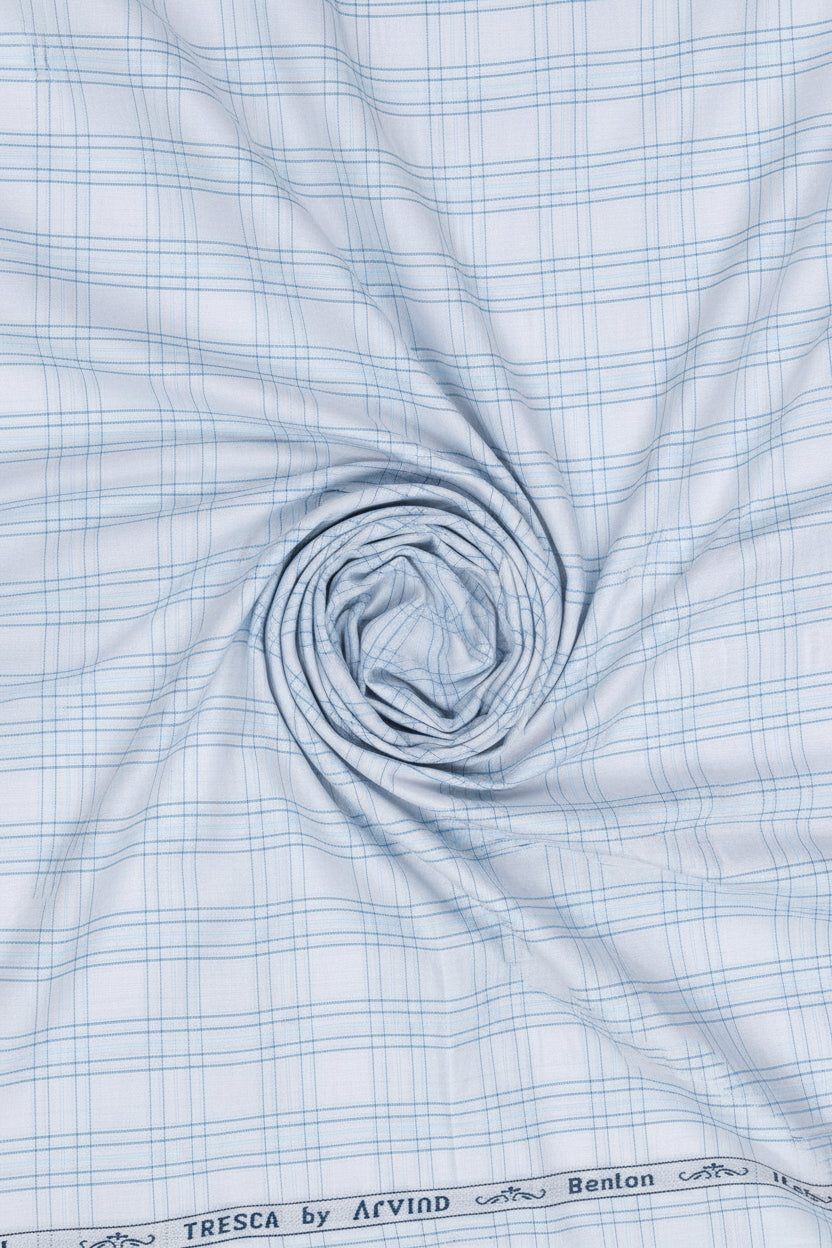 Sky blue Arvind Tresca shirt fabric with Giza cotton checks, showcasing soft, high-quality woven textile for shirts.