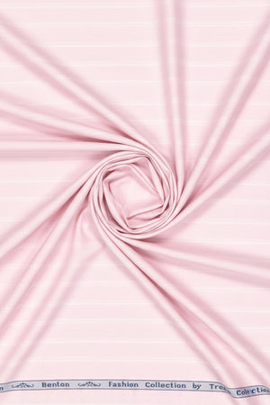 Pink fabric swatch with a visible brand label at the bottom.