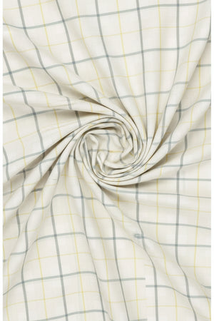Yellow Arvind Tresca shirt fabric with check pattern, premium cotton material, ideal for stylish shirts.