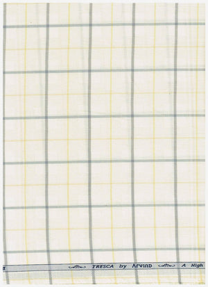 Yellow Arvind Tresca shirt fabric with check pattern, made of premium cotton, showcasing a close-up of the textile design.