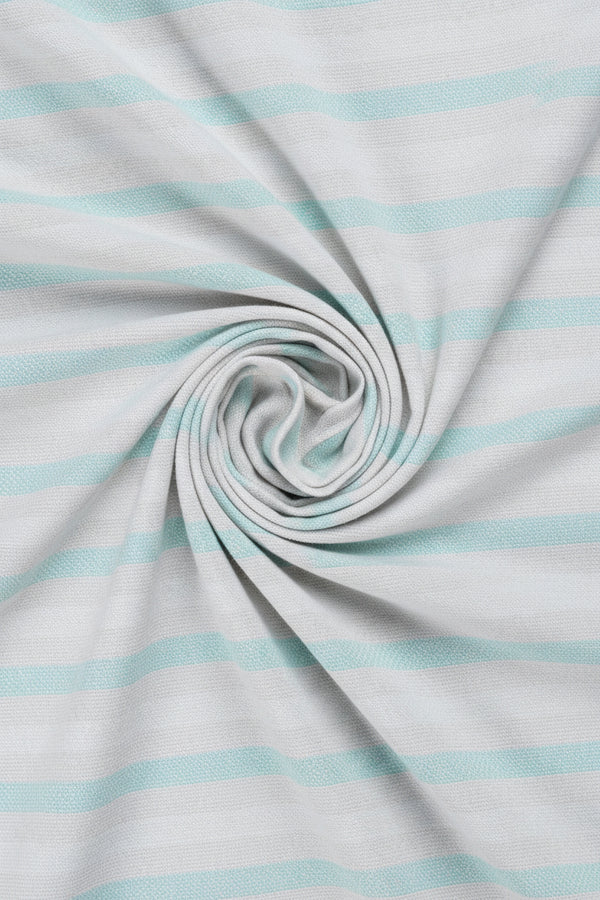 Arvind Tresca shirt fabric in premium cotton with silver and turquoise blue stripes, showcasing a close-up of the striped textile.