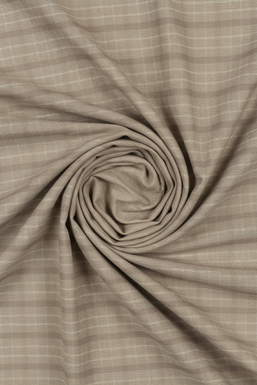 Arvind Tresca shirt fabric with brown check pattern on beige tan background, made of premium cotton for shirting.