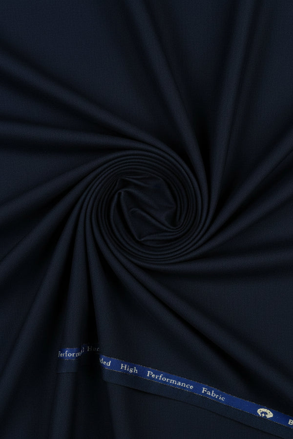 Georgia Gullini of Italy Polywool Super 100’s suiting fabric in dark grey, a premium wool blend suitable for tailored suits.