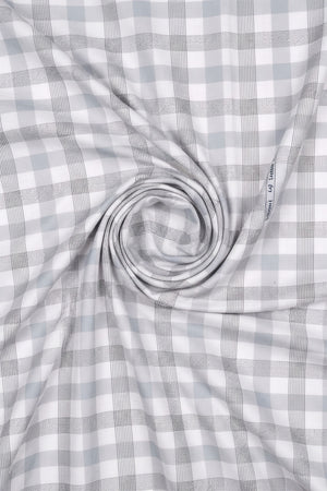 Arvind Tresca cotton shirting fabric with grey checks on white, unstitched fabric suitable for shirts or garments.