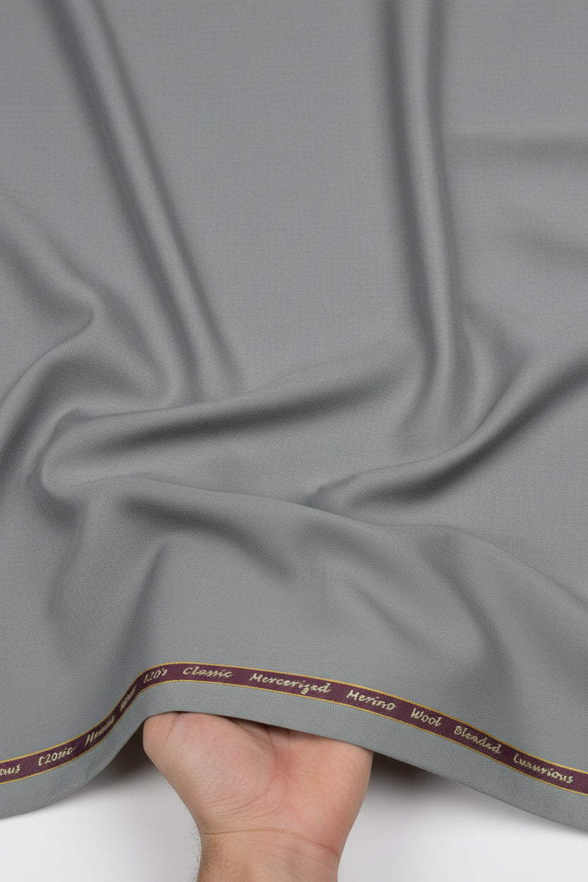 Grey Georgia Gullini of Italy Super 120’s poly wool trousers and suiting fabric, showing the tailored fabric texture and detail.