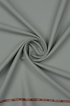 Grey Georgia Gullini of Italy Super 120's poly wool fabric for trousers and suiting, close-up of the textured textile material.