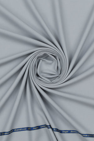 Grey Georgia Gullini of Italy super 120’s polywool fabric for trousers and suiting, showing the unstitched fabric with a smooth texture.