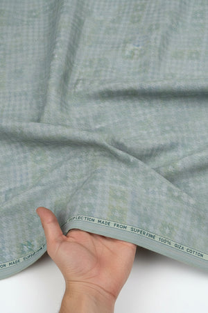Green multicolor Arvind Tresca shirt fabric made from Giza cotton, showcasing a detailed pattern and soft texture.