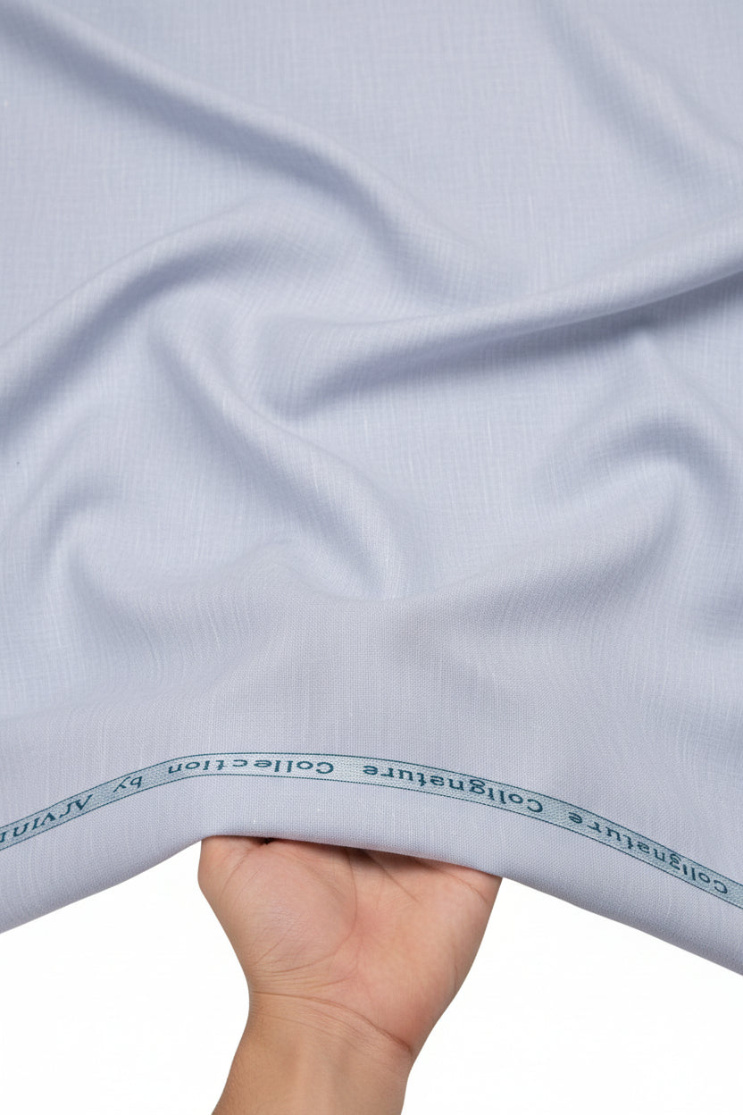 Lavender linen Tencel shirt fabric from Arvind Primante collection, showing soft, textured textile suitable for shirts.