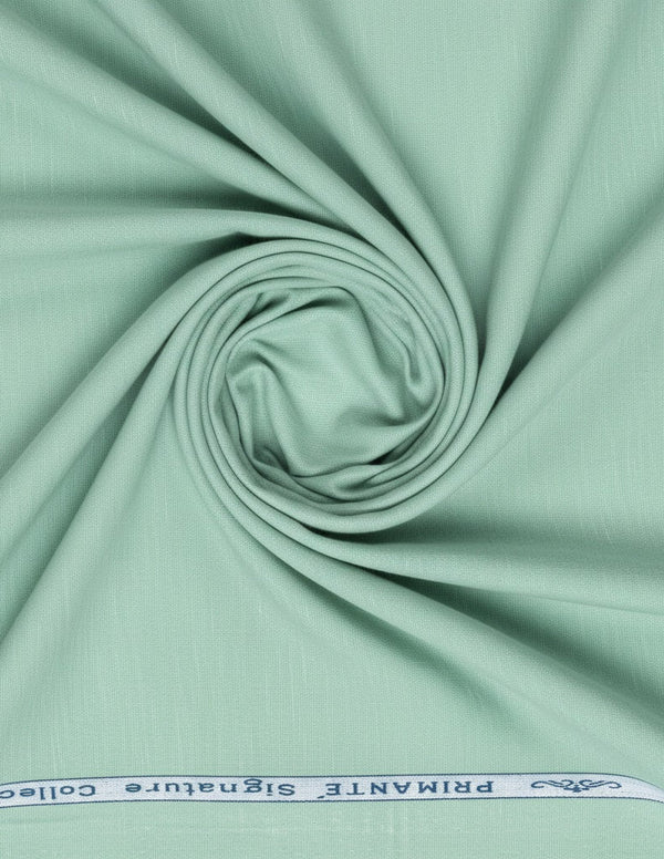 Pista green linen Tencel shirt fabric by ARVIND Primante, showing a close-up of soft, textured textile material.