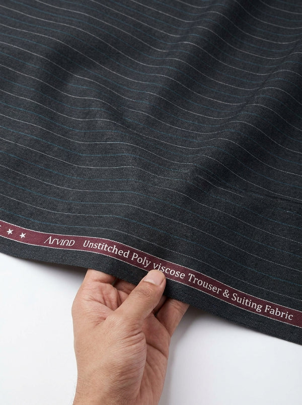 Gray Arvind poly viscose suit fabric swatch showing a smooth, lightweight viscose blend textile with subtle texture.