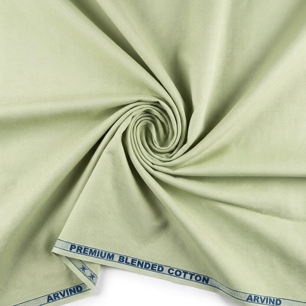 Arvind Tresca Giza Cotton shirting fabric in Pista Tinge with a swirl pattern, showcasing its soft, lightweight textile.