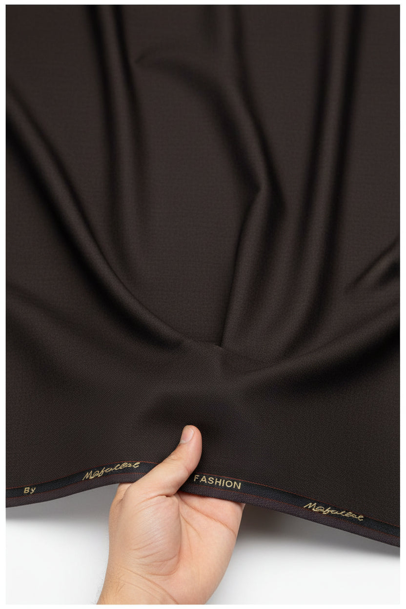 Brown Mafatlal poly viscose trouser and suiting fabric sample with woven texture, suitable for formal wear.