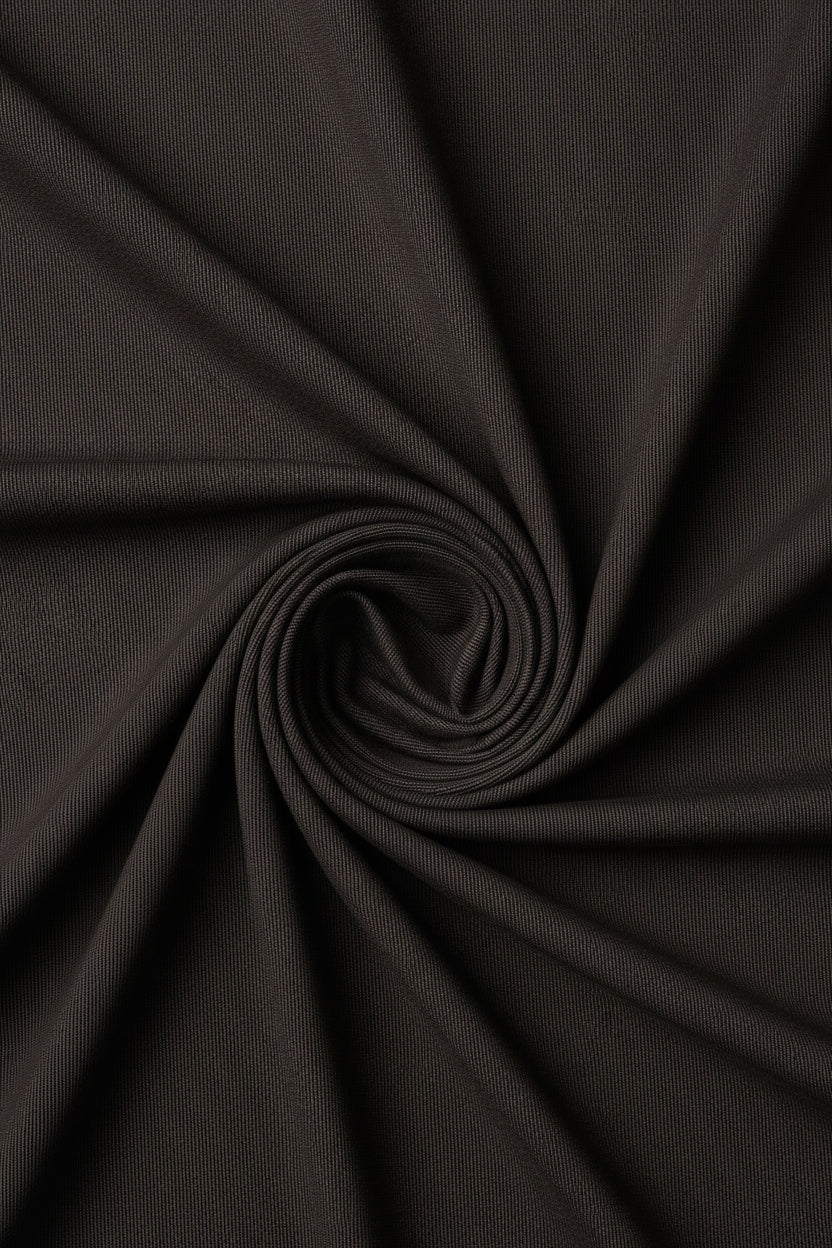 Brown Mafatlal Polyviscose trouser and suiting fabric roll, showcasing the soft, woven textile material for tailored garments.