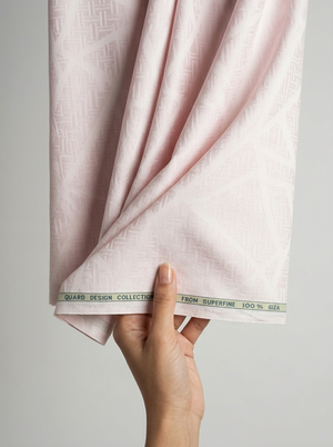 Light pink Arvind Tresca Jacquard cotton unstitched shirting fabric with intricate woven patterns, ideal for custom shirts.