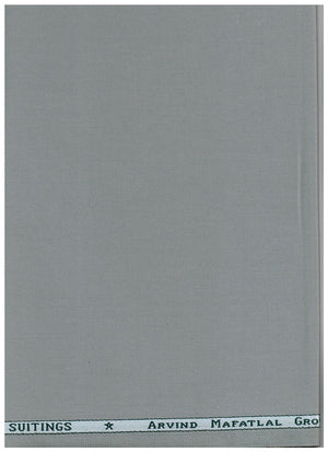 A flat, light gray fabric or paper swatch with a narrow printed header at the top reading 'SUITINGS' and 'ARRIVED MATRICAL GRO'.