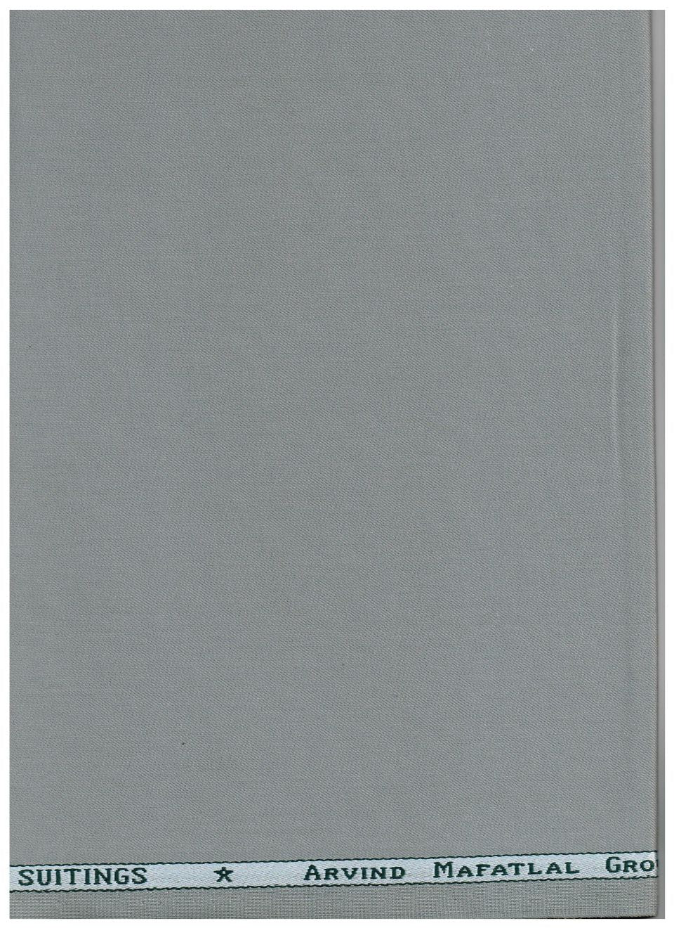 A flat, light gray fabric or paper swatch with a narrow printed header at the top reading 'SUITINGS' and 'ARRIVED MATRICAL GRO'.