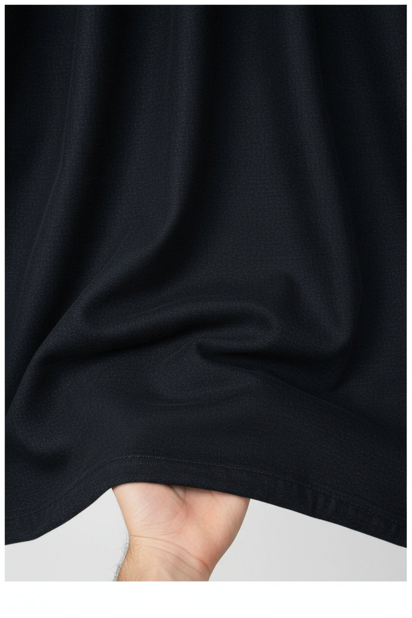Mafatlal unstitched poly viscose trousers and suiting fabric in charcoal grey, fabric close-up showing texture and color.