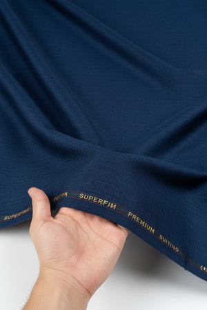 Royal blue Arvind poly viscose trousers and suiting fabric, showcasing the smooth texture and vibrant color of the fabric.