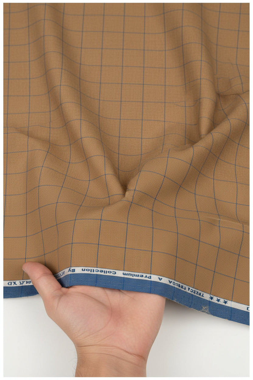 Unstitched Tresca cotton checks shirting fabric by Arvind in caramel color, showing the fabric's soft texture and check pattern.