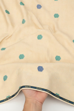 Beige fabric with blue geometric pattern and 'Made in Italy' label