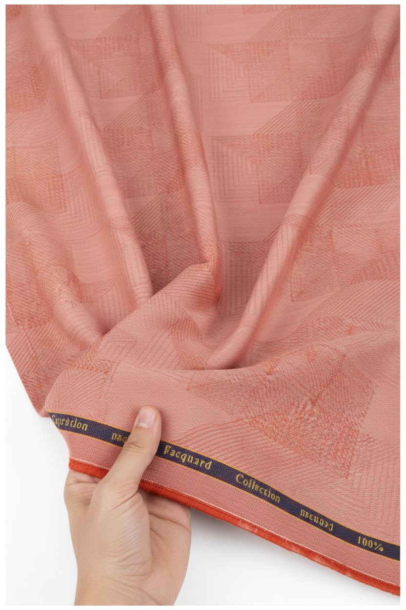 Arvind Jacquard cotton shirting fabric in vibrant carrot orange with intricate jacquard pattern, ideal for stylish shirts.