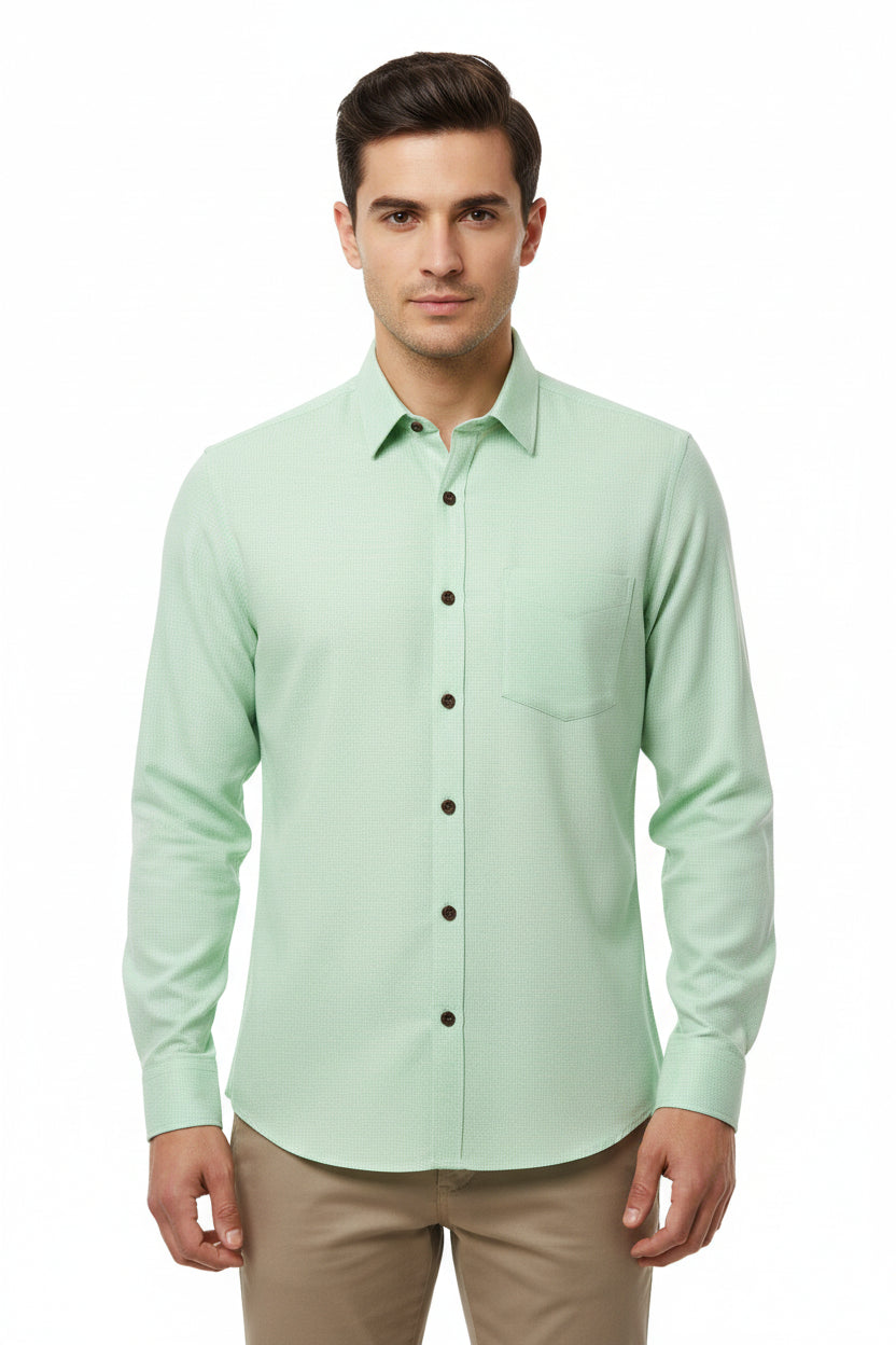 Green Arvind unstitched PC shirting fabric shown in a close-up image with a smooth, woven texture.